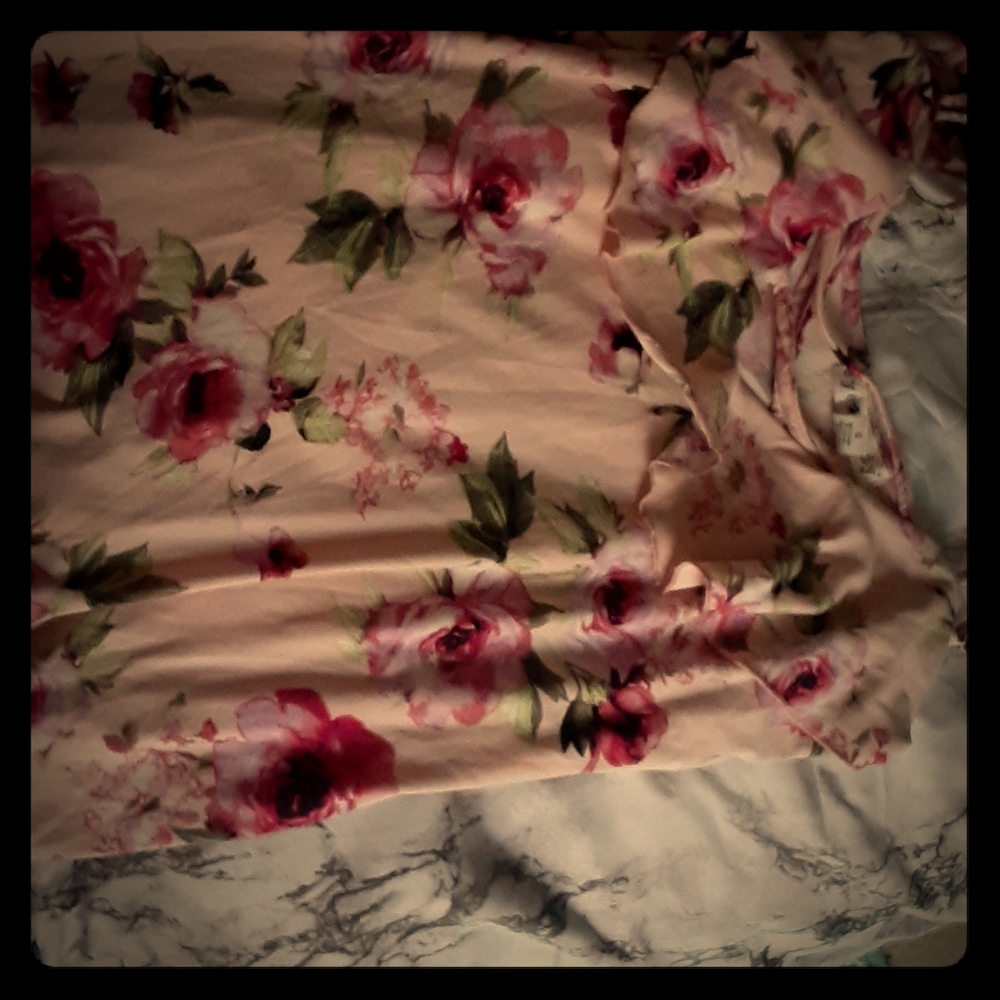 A flowy flowery tank top never worn before!